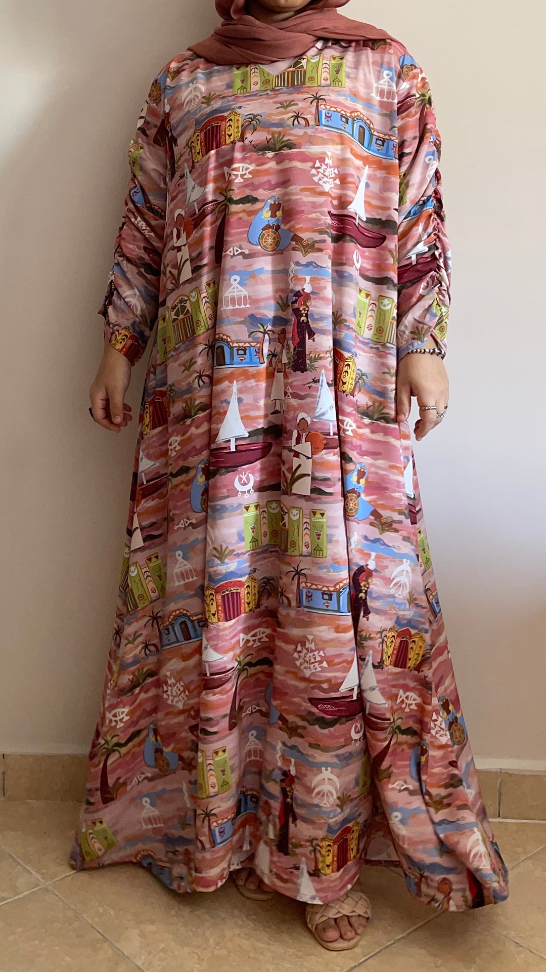 “ النوبه “cloche dress